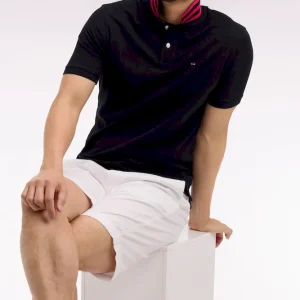 Polo manches courtes en piqué coton noir dessous de col rayé coupe slim