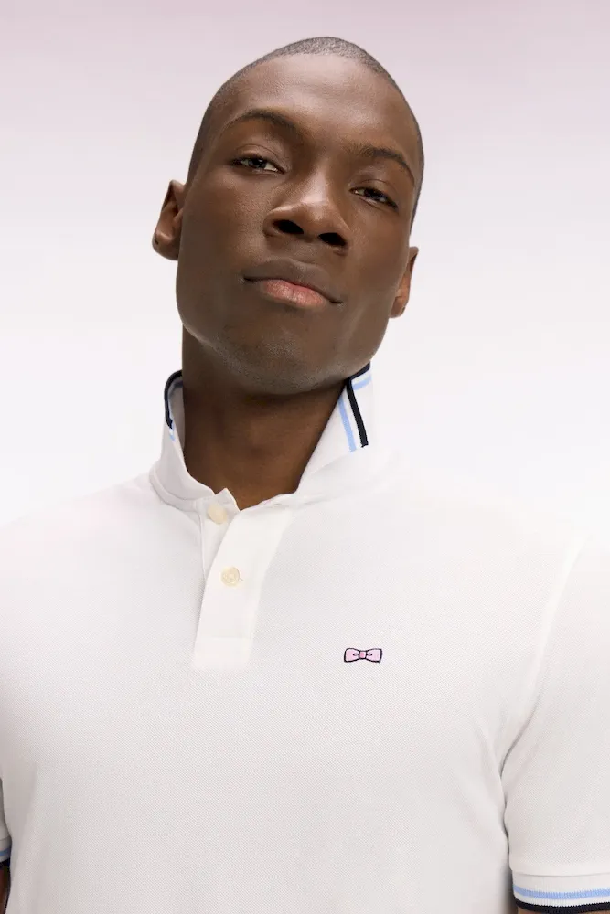 Polo manches courtes en coton blanc détails rayés coupe regular – Bild 4