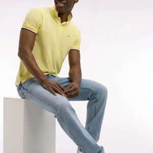 Polo manches courtes en coton jaune détails rayés coupe regular