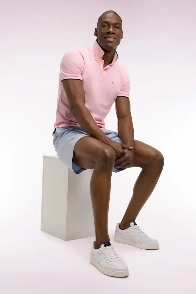 Polo à manches courtes en coton rose détails rayés coupe regular