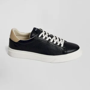 Paire de baskets basses en cuir bleu marine