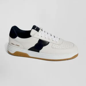 Baskets basses en cuir blanc découpe bleu marine