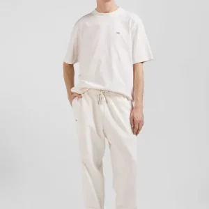 Jogging unisexe en molleton coton écru surteint coupe Relaxed