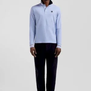 Polo manches longues en piqué coton ciel écusson gomme coupe Regular
