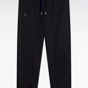 Alternative view of Jogging en molleton gratté marine à passepoil et plis avant coupe droite