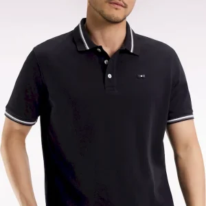Polo manches courtes en coton noir détails rayés coupe ample