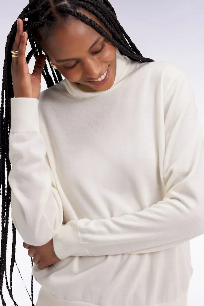 Pull à col roulé en laine mérinos écru