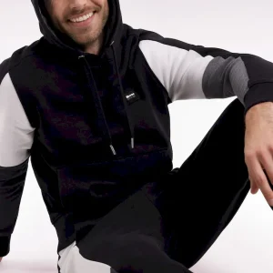 Sweatshirt à capuche noir découpes manches contrastées