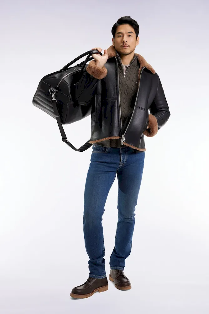 Blouson en peau lainée noir col marron